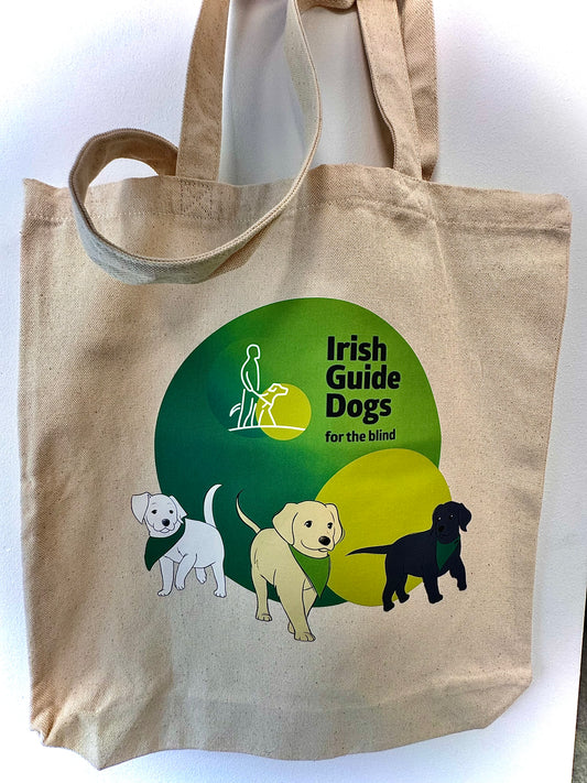 Canvas bag with Irish Guide Dogs for the Blind Logo and three illustrated puppies