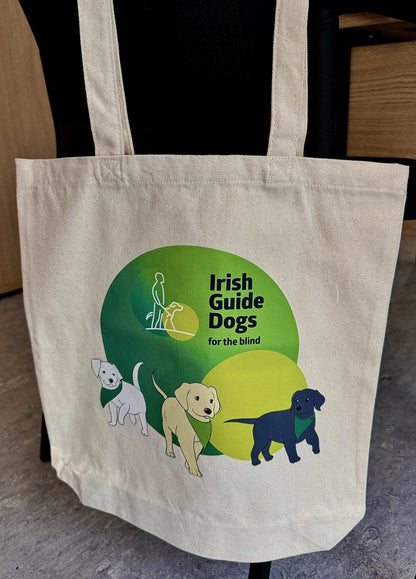 Irish Guide Dogs for the Blind canvas bag hanging on a chair.